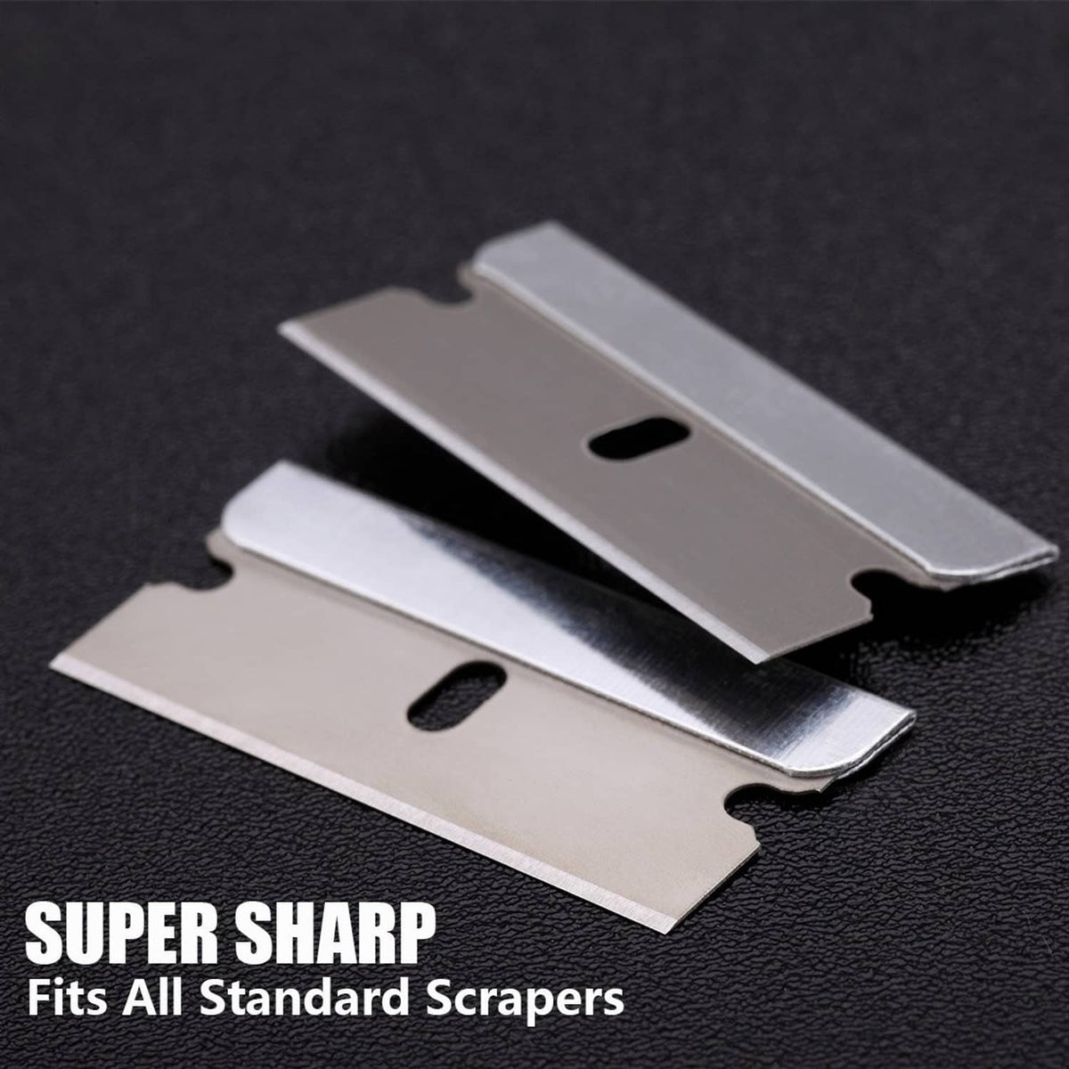 Close-up of two silver single-edge razor blade scraper inserts