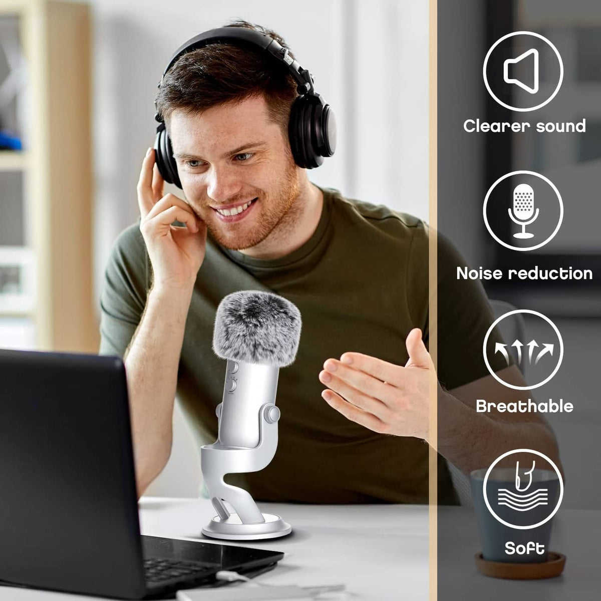 Grey furry microphone windscreen on a desktop studio microphone with stand