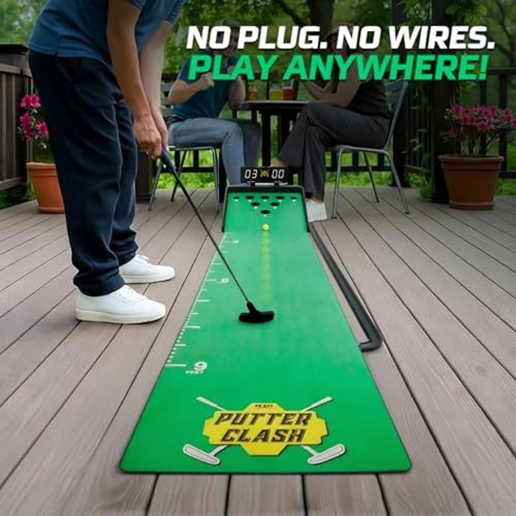 Green putting game mat on outdoor surface with black putter and digital display