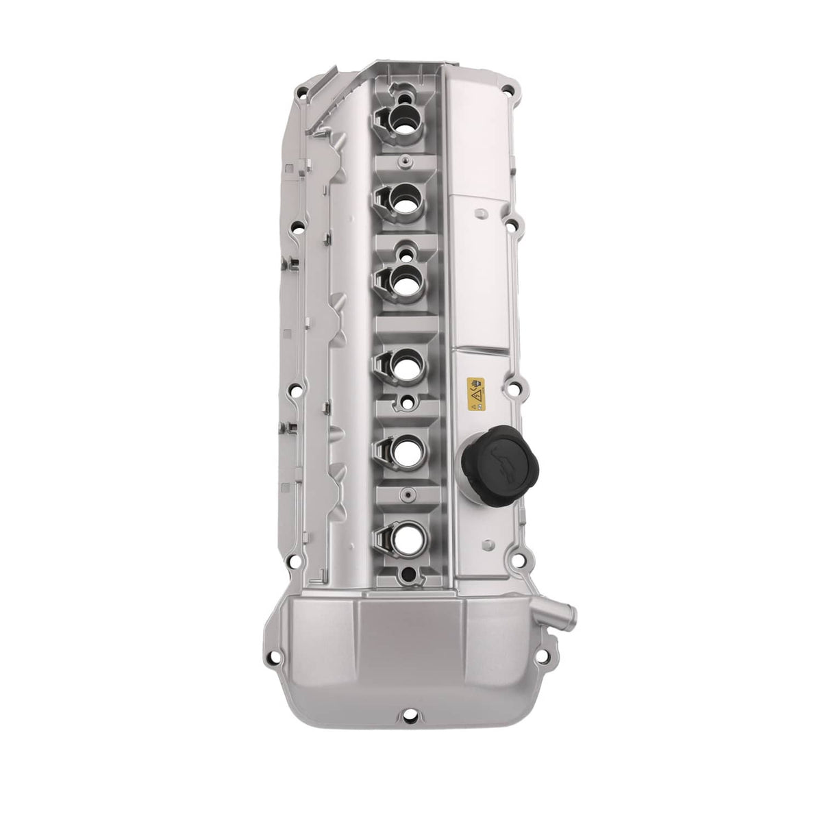 Aluminum engine valve cover, upright side view with ports, channels, and black cap