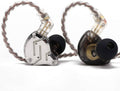 Dual in-ear monitors with clear braided cable, metal housings, and black silicone eartips