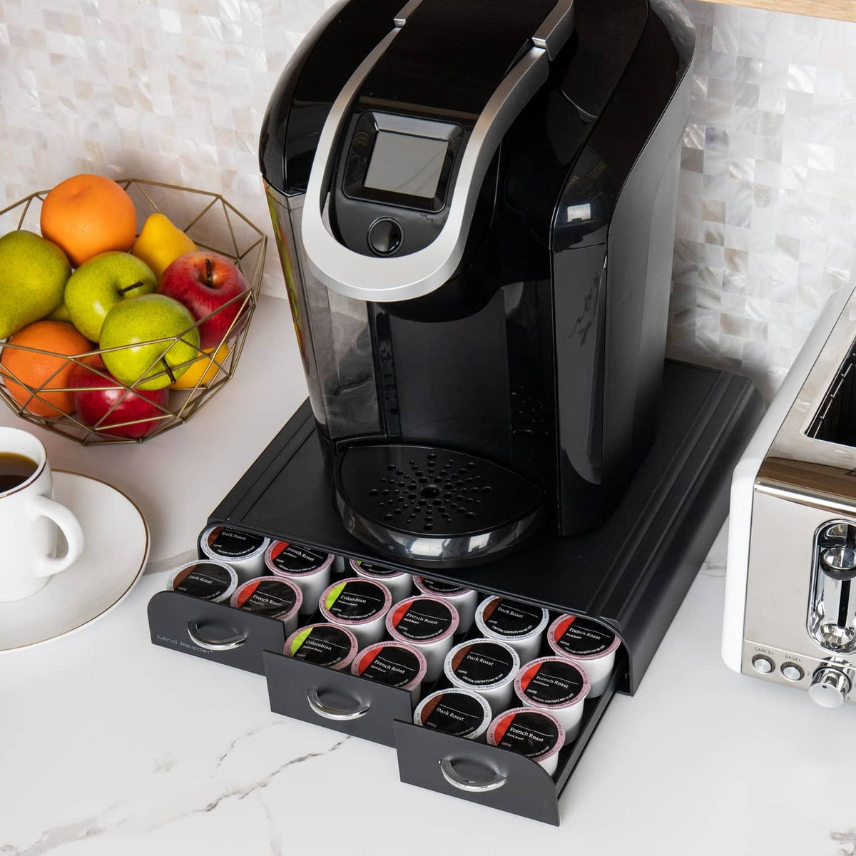 Black 3-drawer coffee pod organizer with open front trays arranged for pods