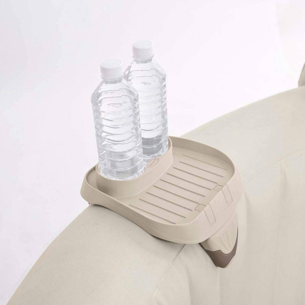 Light gray spa cup holder tray mounted on spa edge, fits two bottles