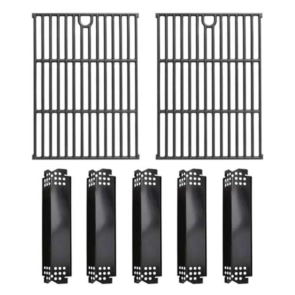 Two black grill grates and several heat plates with round perforation holes