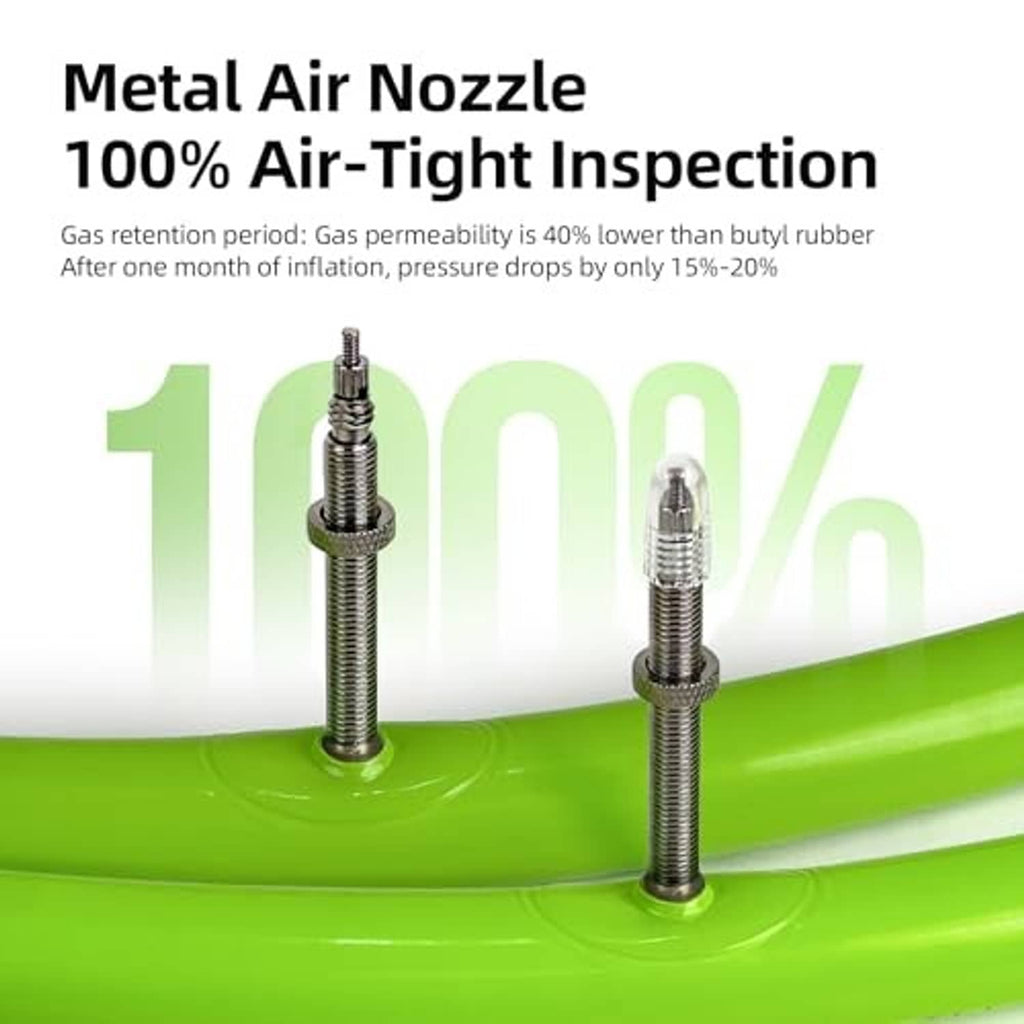 Green bicycle inner tube with two metal air nozzles standing upright