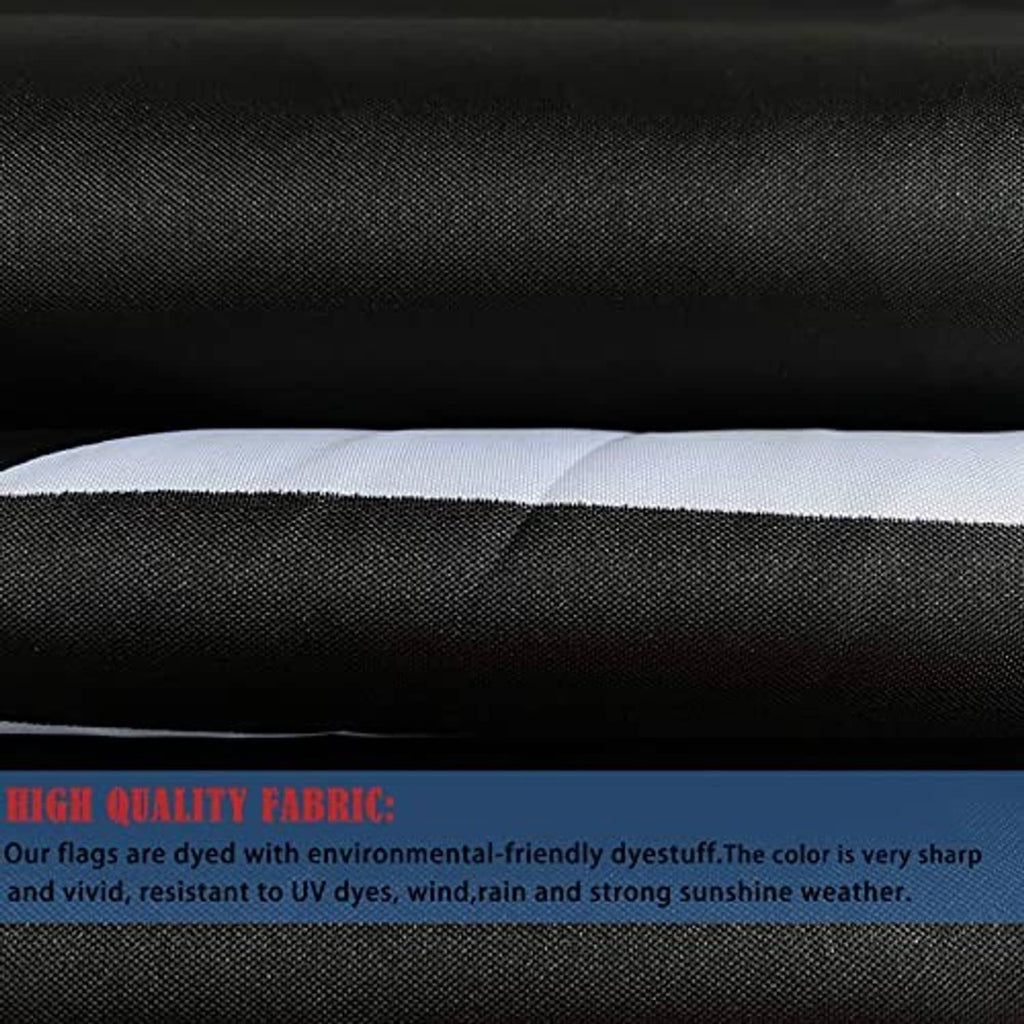 Black flag fabric close-up with textured weave and white stitched edge hem.