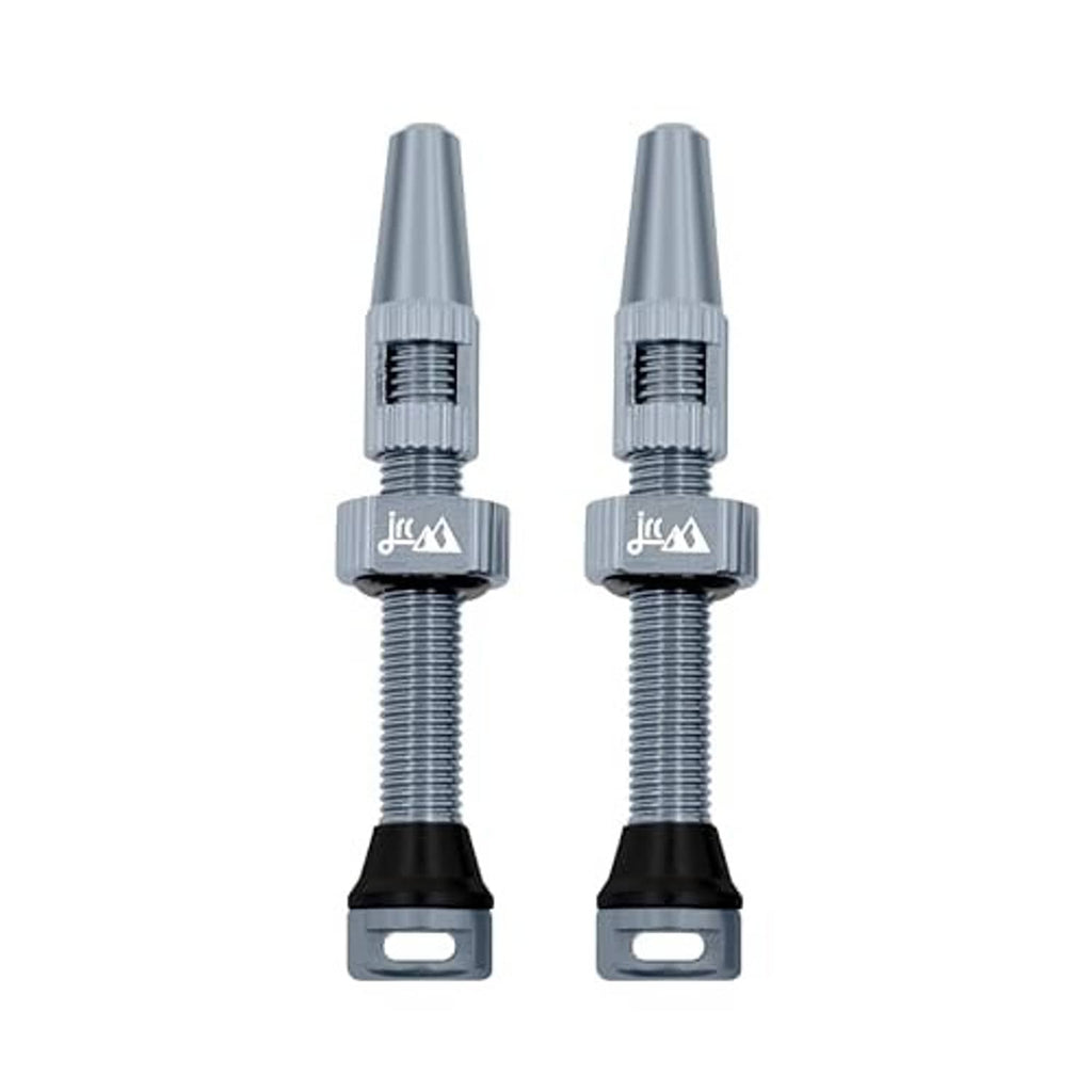 Gunmetal Presta tubeless valve stem pair with threaded metal shaft and black rubber base.