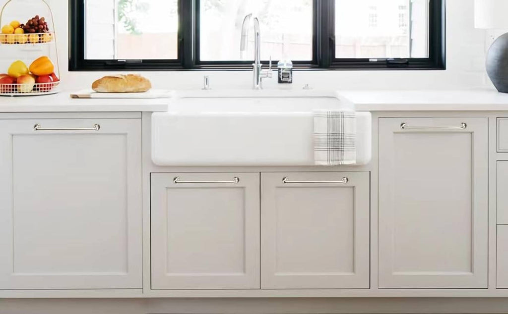 Polished nickel cabinet pull handles on drawers and doors, matching finish