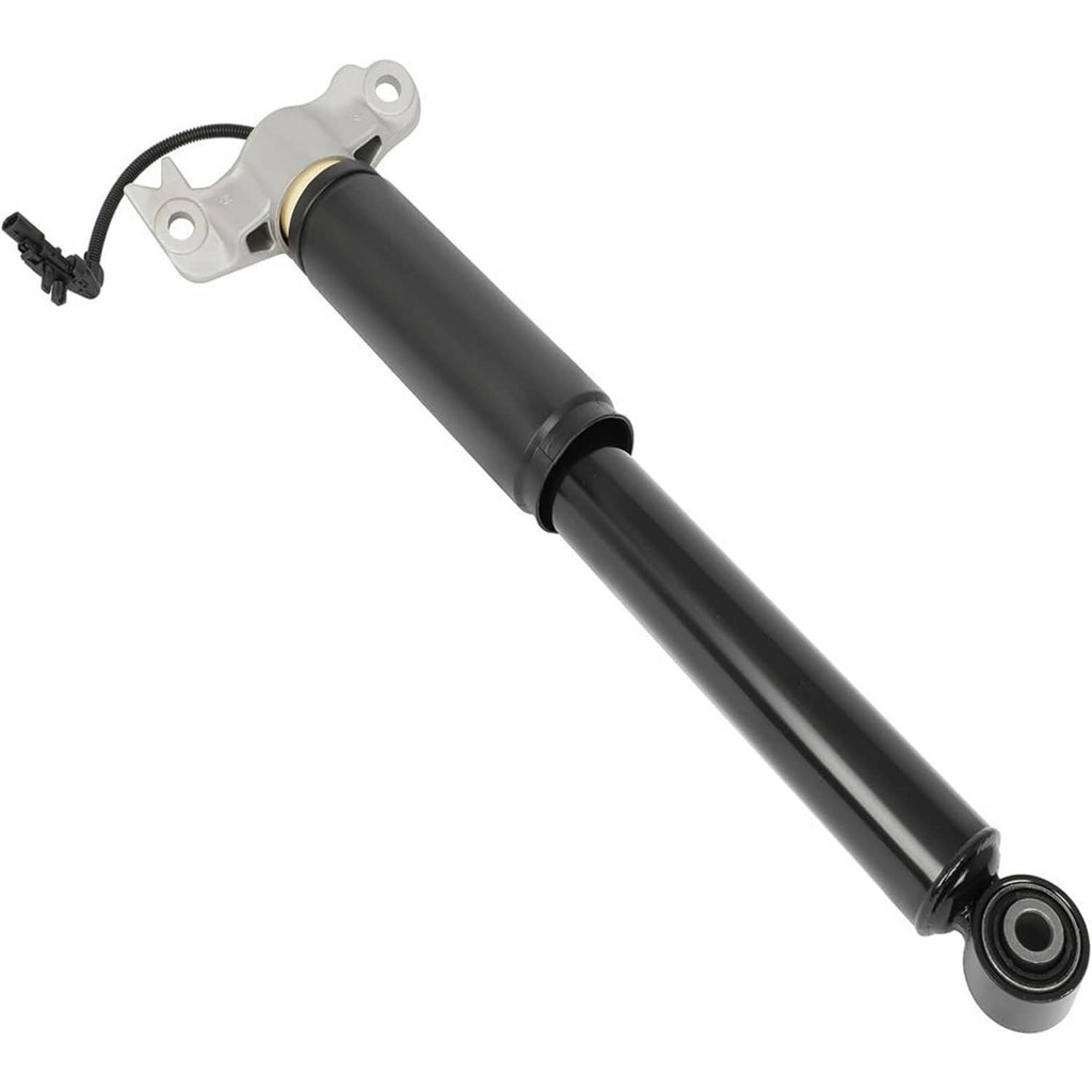 Shock strut assembly with black damper and coil spring, silver top mount and bushing
