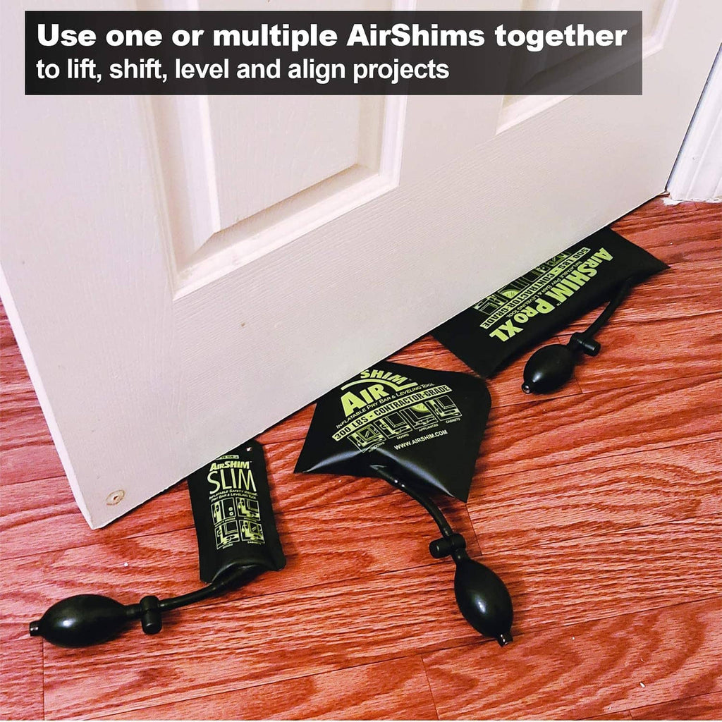 Inflatable leveling shims with black pump bulbs, sized for lifting and leveling gaps