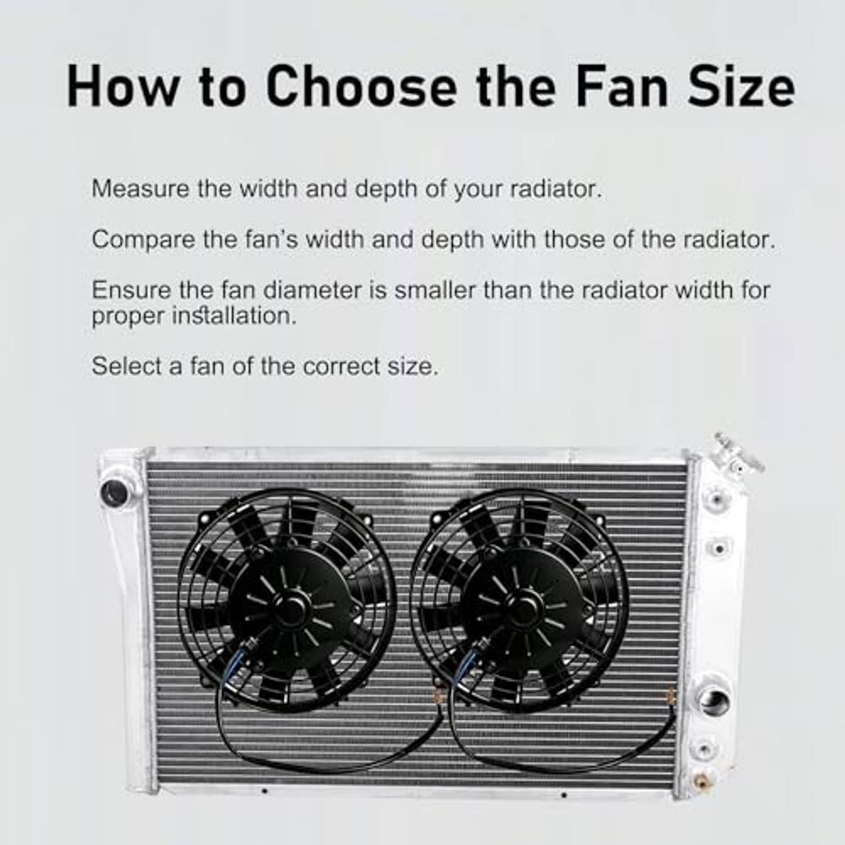 Two black radiator cooling fans mounted on a metal radiator core