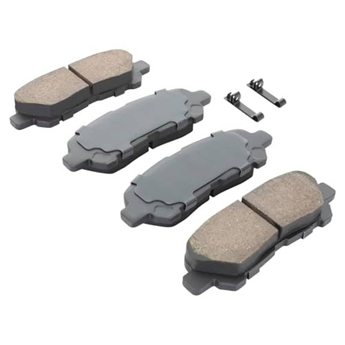 Rear ceramic brake pads with light gray friction material and metal hardware clips