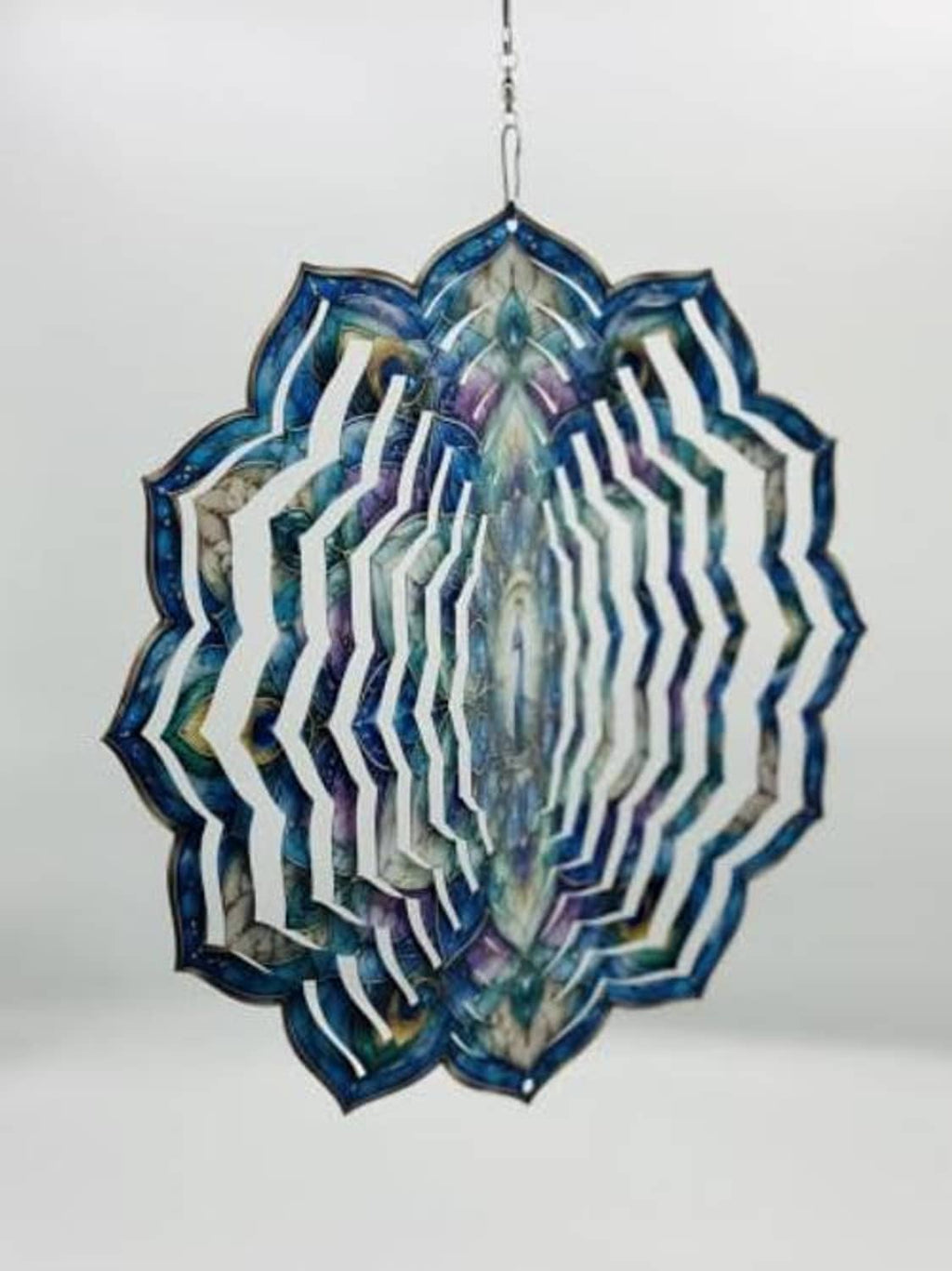 Peacock wind spinner with blue-purple layered feather fan, hanging centerpiece