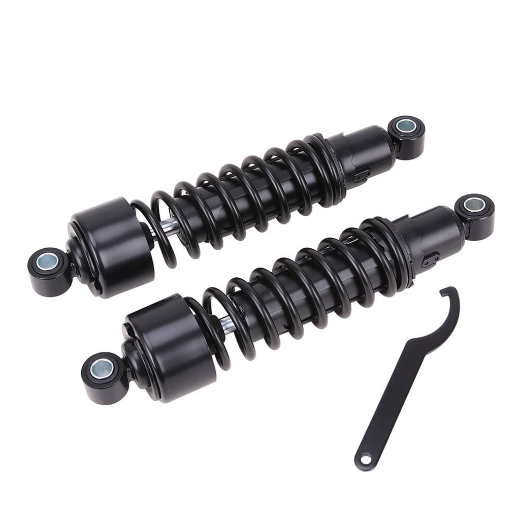 Black rear shock absorber pair with coil springs and included installation tool