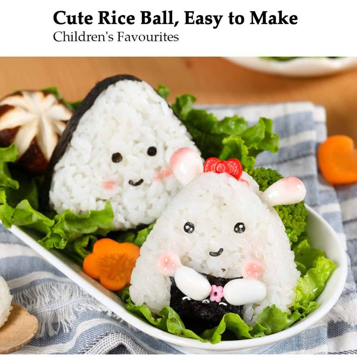Cute triangle onigiri rice balls with nori faces on a plate with lettuce