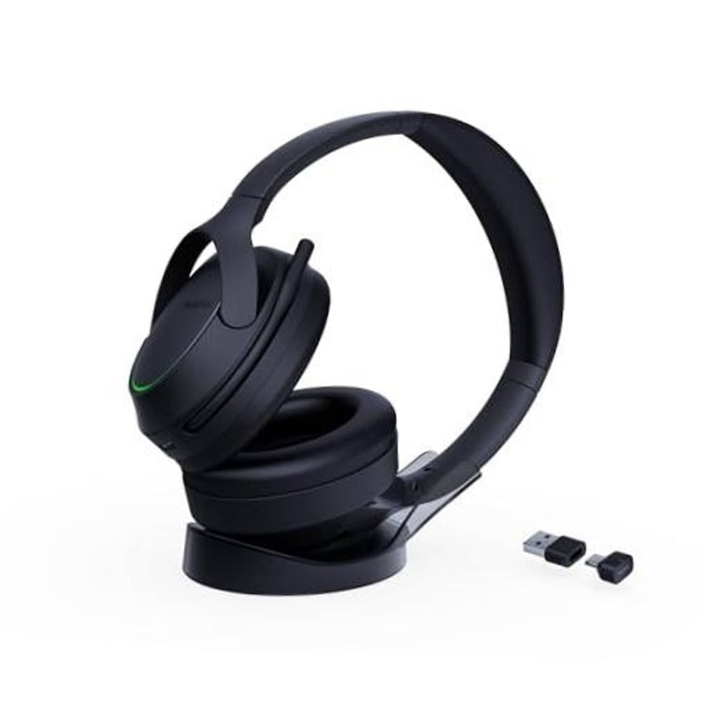 Black over-ear Bluetooth headset with boom mic and USB adapter, cushioned ear pads.