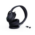 Black over-ear Bluetooth headset with boom mic and USB adapter, cushioned ear pads.