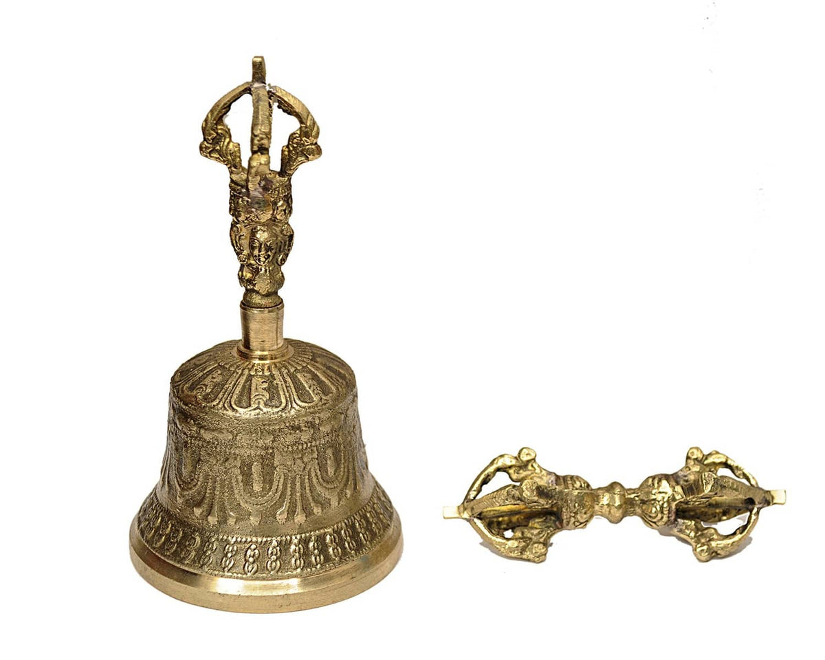 Brass Tibetan meditation bell with engraved base and paired dorje vajra