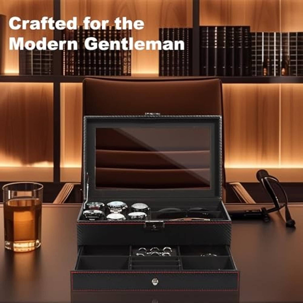Black watch jewelry box with hinged clear lid, set on a tabletop
