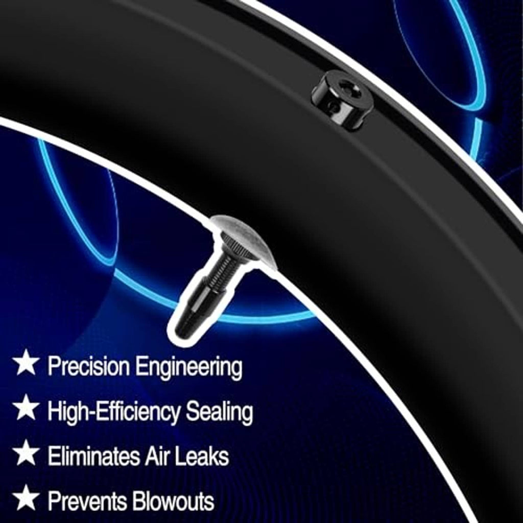 Black Presta tubeless valve stem inserted in a tire, showing threaded body and head