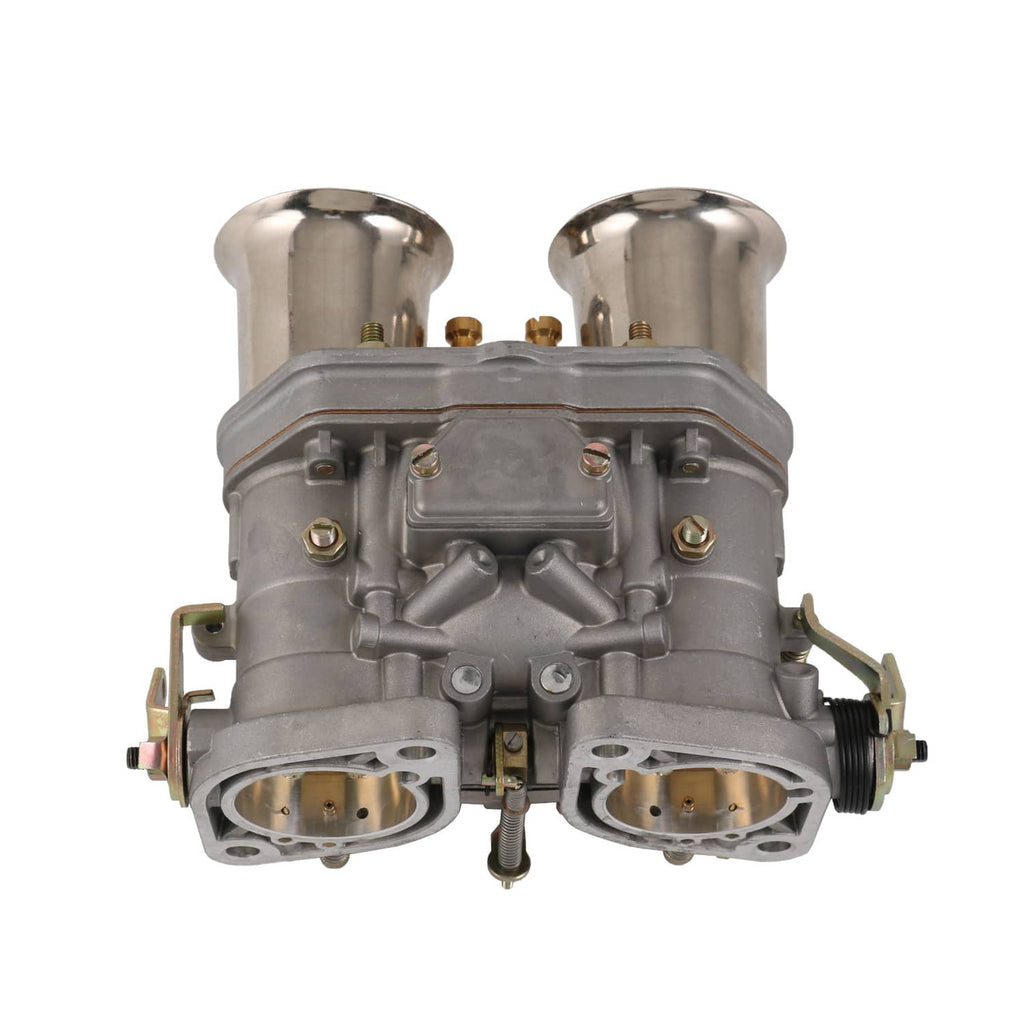 Carburetor with two upper air inlets, central linkage, and two lower circular ports