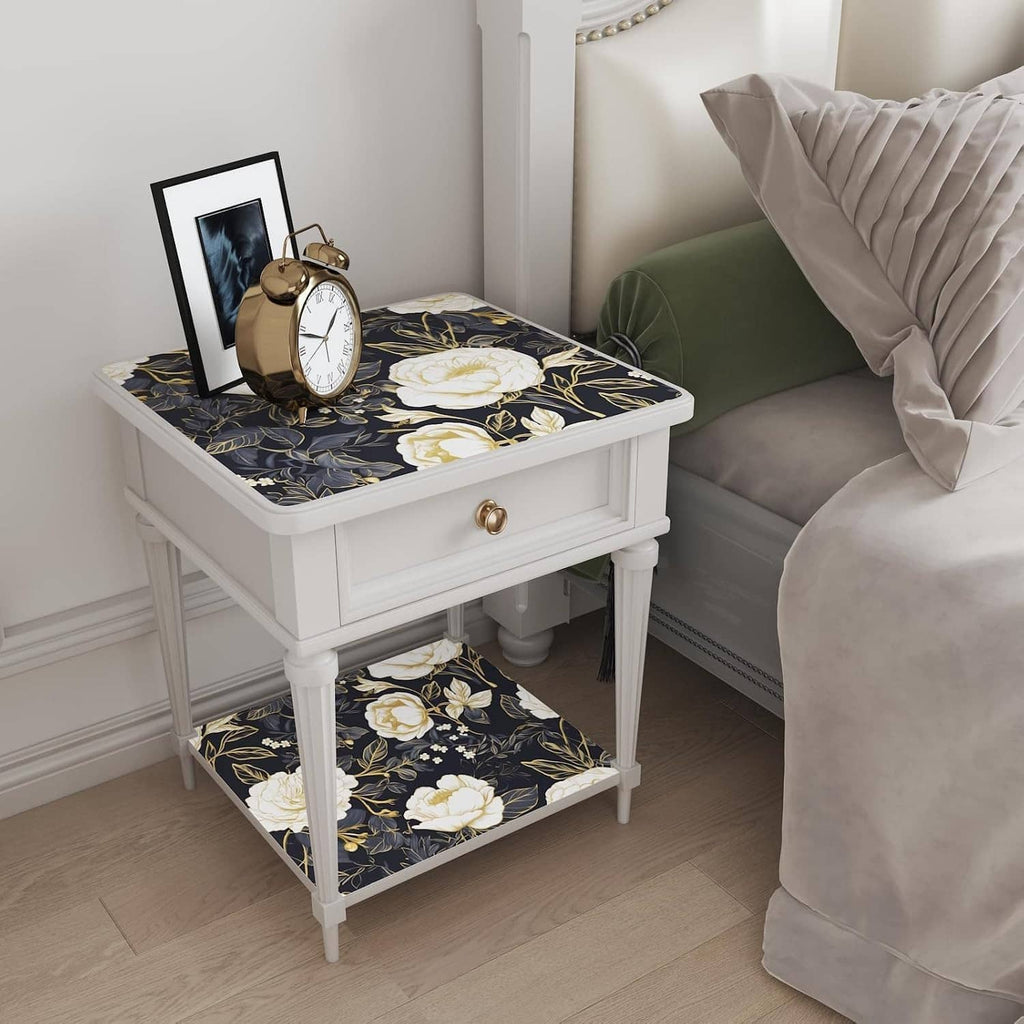 Floral contact paper on side table and shelf: white flowers, gold leaves on dark blue