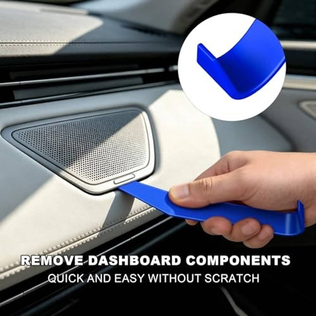 Blue trim pry tool lifting dashboard component near a speaker grille in a car