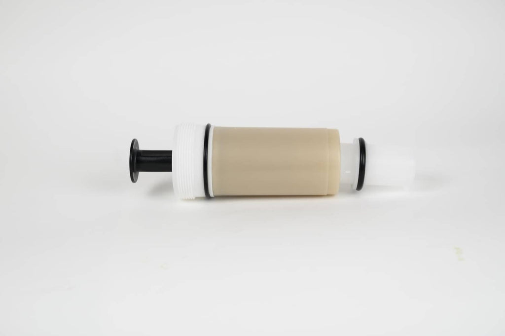Flushmate flush valve cartridge with beige cylinder and white end caps