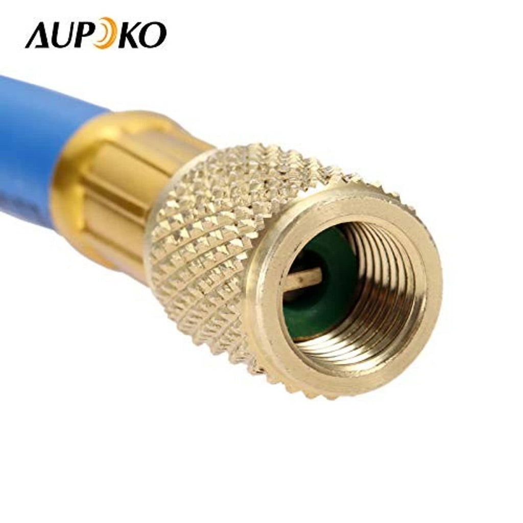 Close-up of blue hose with gold brass threaded connector fitting