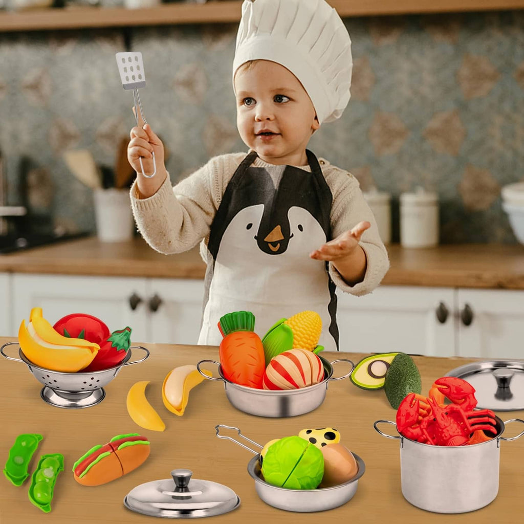 Pretend play kitchen cookware with a child holding a ladle over toy food pots.