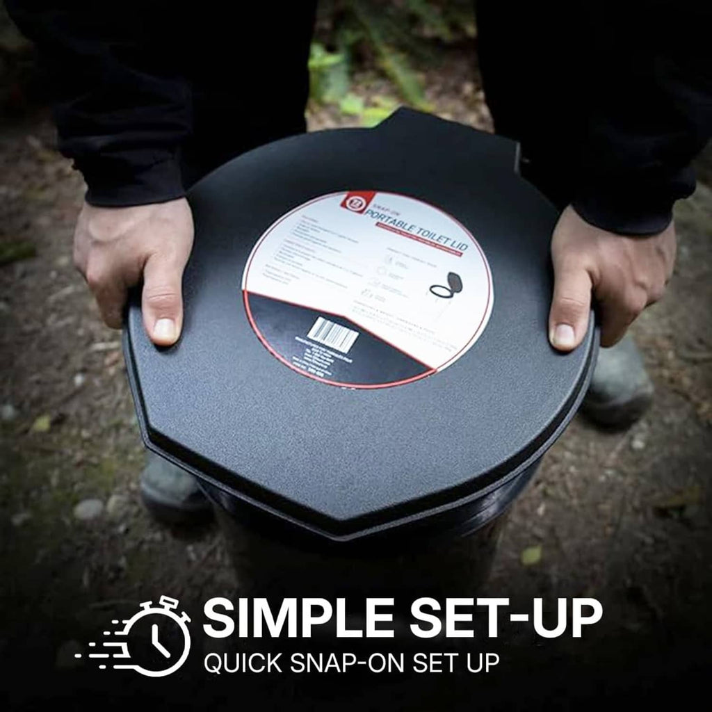 Black toilet lid with printed label on top, carried outdoors