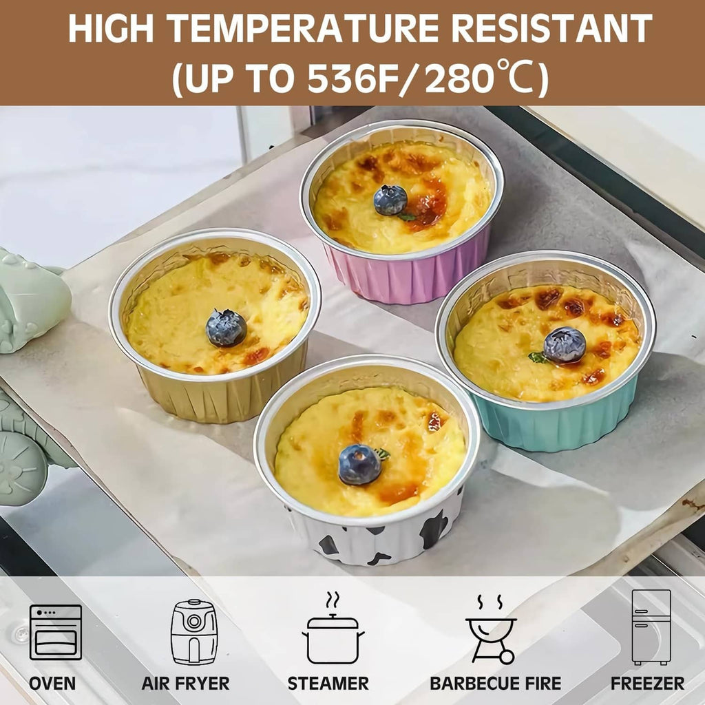 Disposable ramekins with lids holding baked custard on a tray