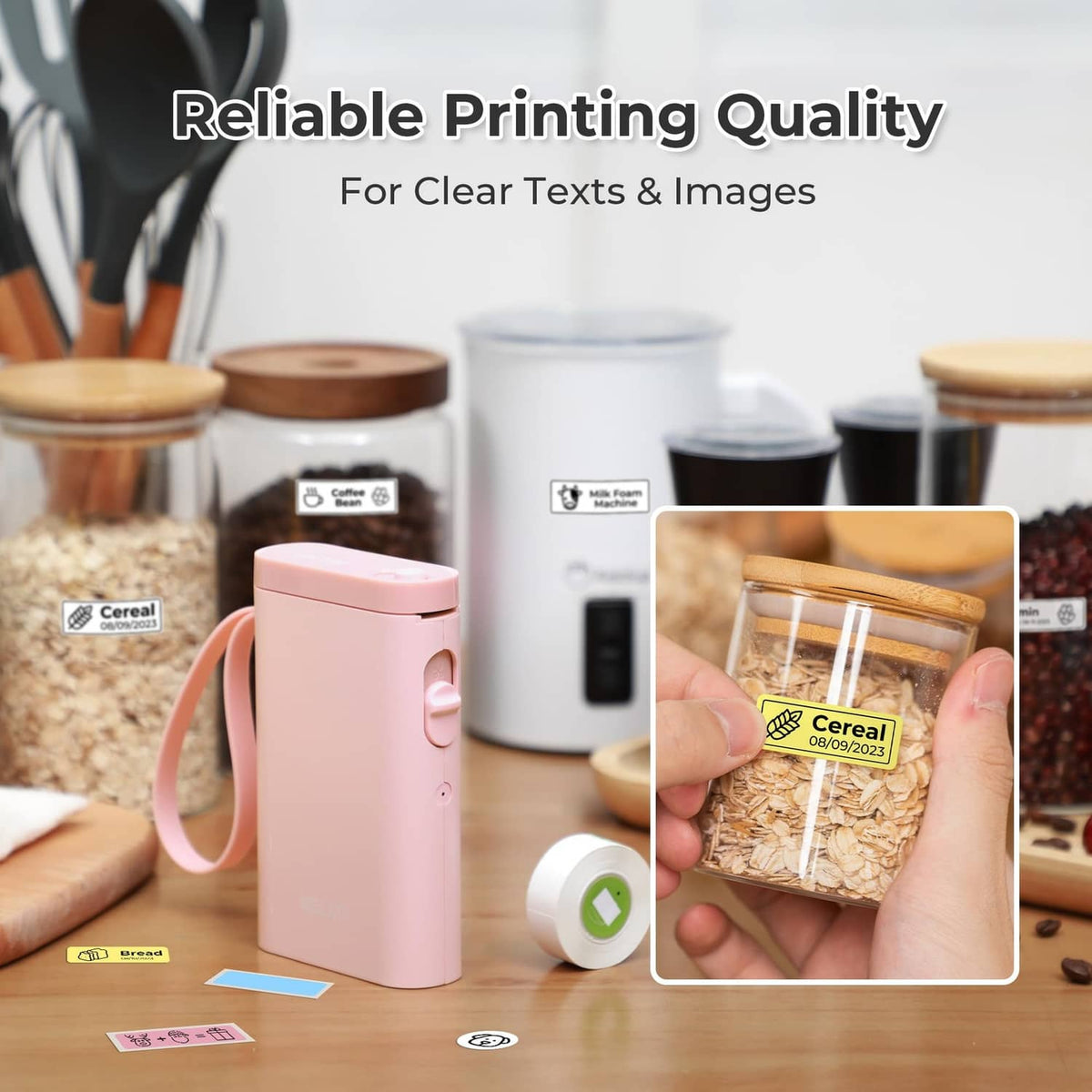 Pink label maker printer with clear label printing samples on table