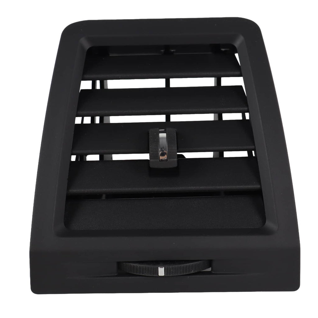 Dashboard A/C air vent grille with horizontal louvers and center control, dark.
