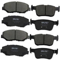 Set of dark gray carbon ceramic brake pads with metal backing and mounting tabs