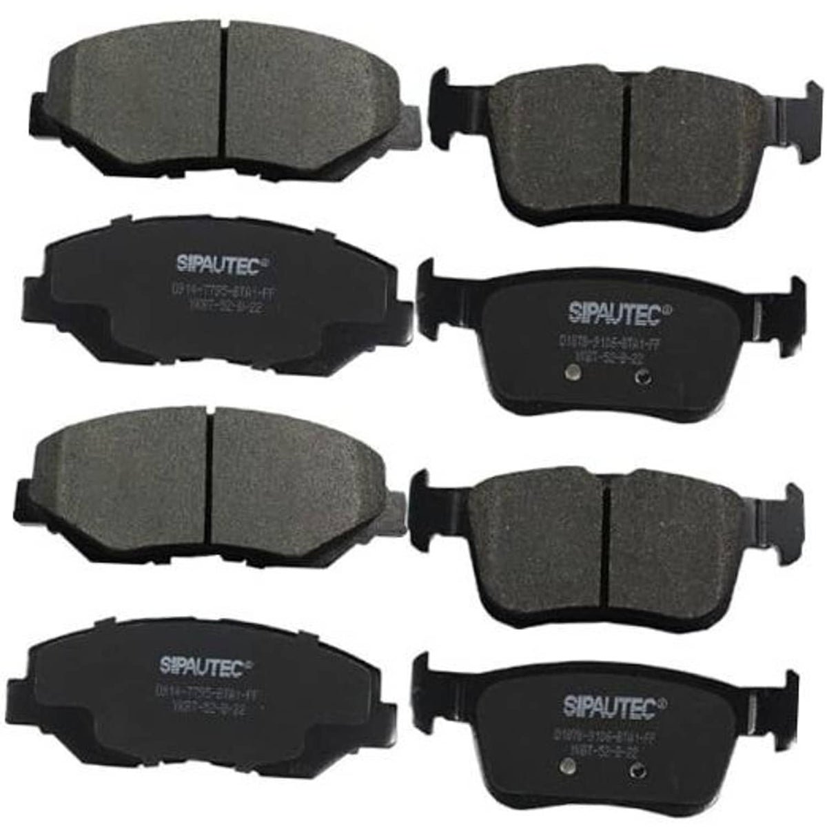 Set of dark gray carbon ceramic brake pads with metal backing and mounting tabs