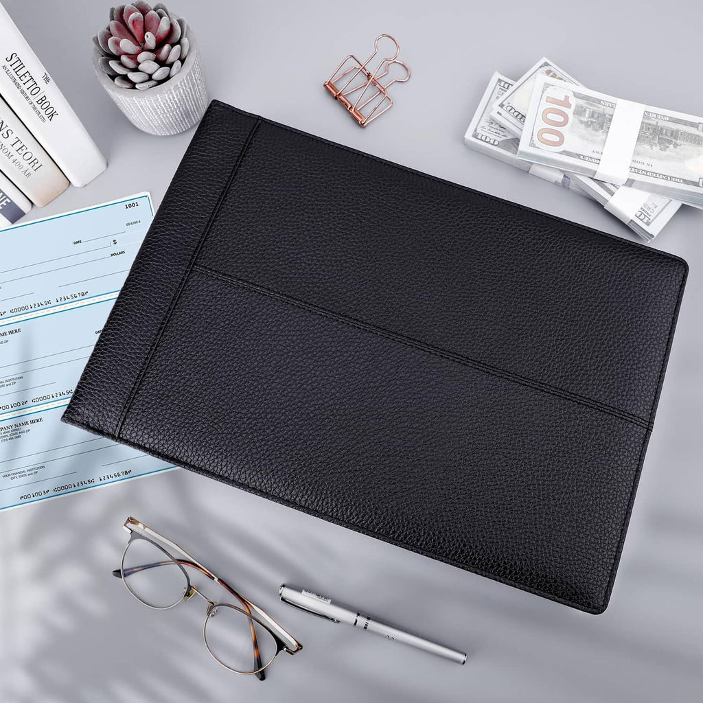 Black checkbook binder with textured cover and inner check sheets displayed