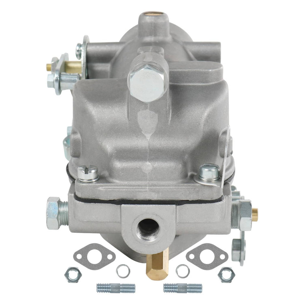 Carburetor with throttle bore, fuel inlet ports, and included small mounting hardware