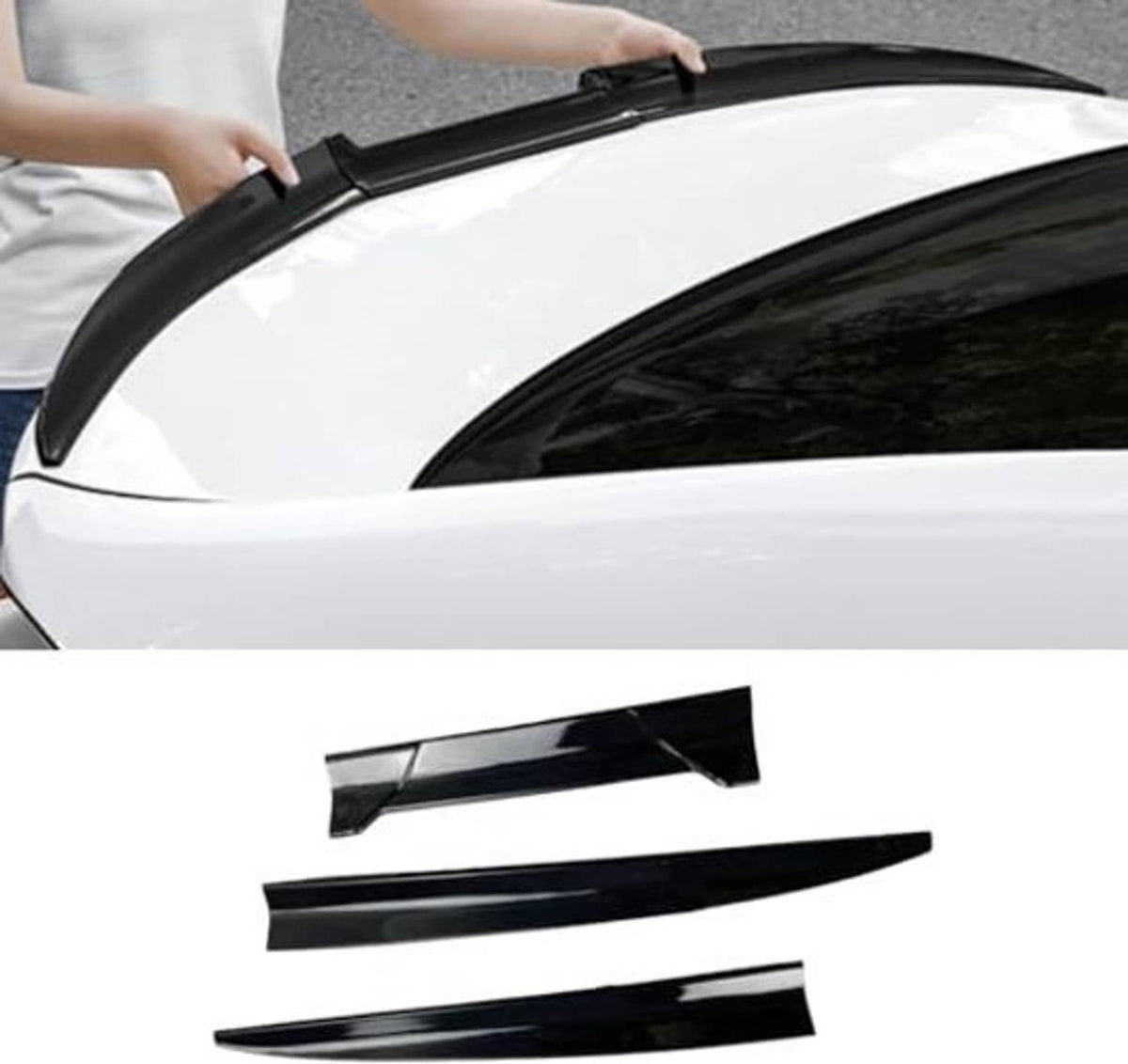 Black tail wing spoiler being installed on a white car trunk