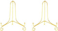 Gold metal decorative plate stand with three curled feet and arched frame.
