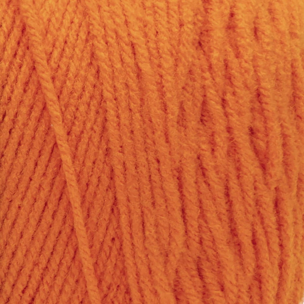 Pumpkin orange chunky yarn texture close-up