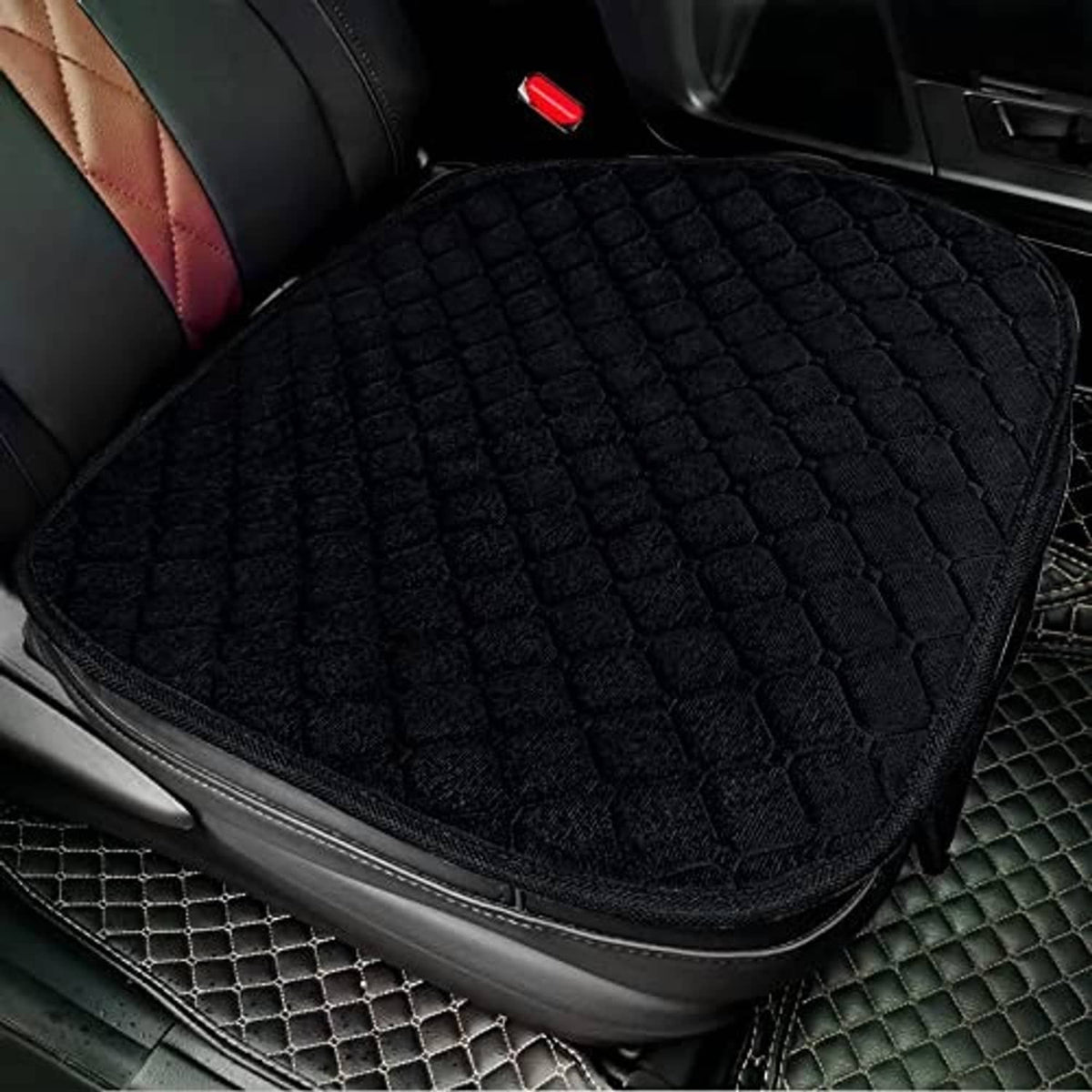 Black front car seat cover with raised diamond quilting and elastic edge