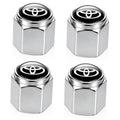 Silver metal tire valve stem cap with black top and Toyota emblem, hex shape