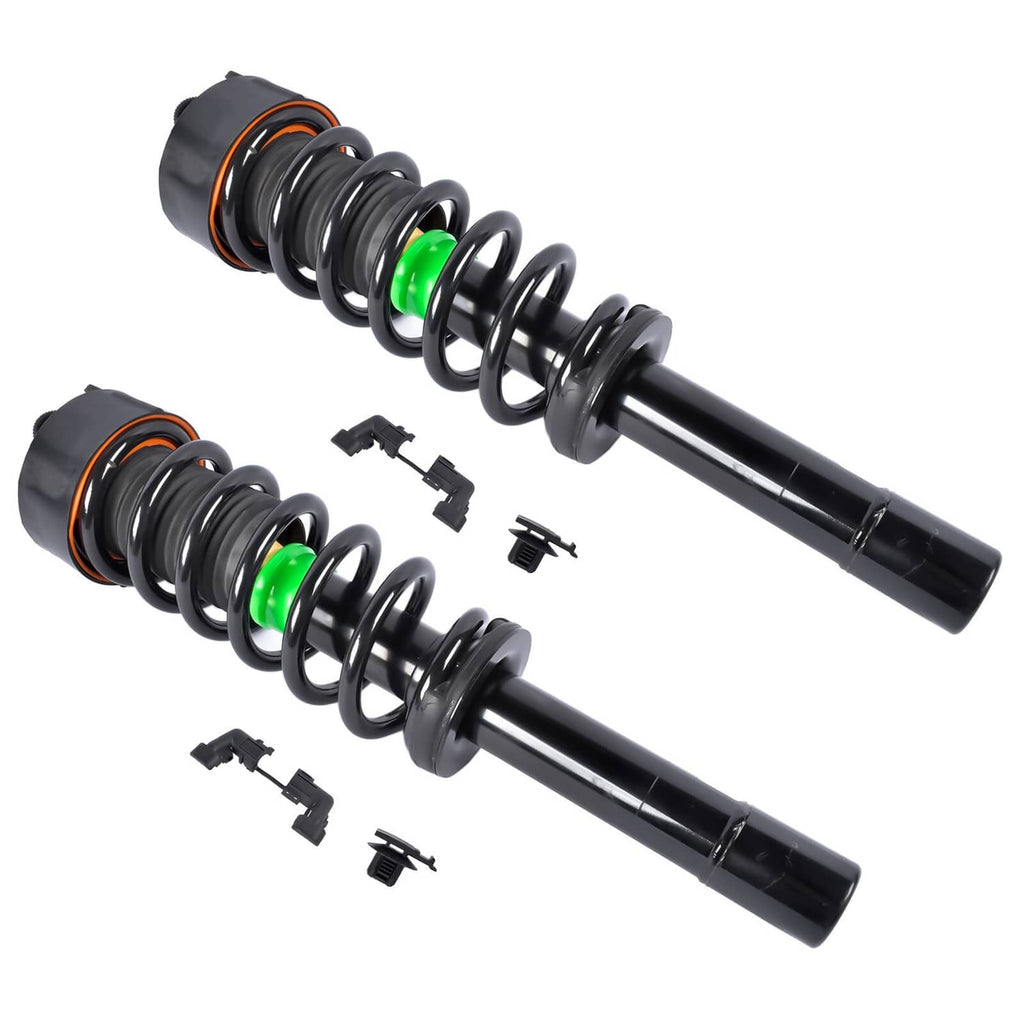 Two front struts with black coil springs, green markers, and electrical connector hardware