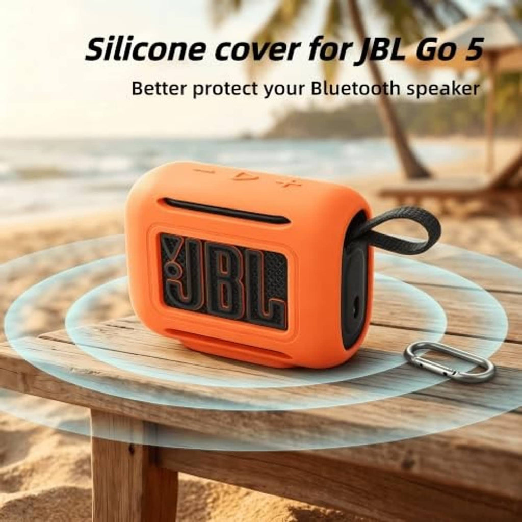Orange silicone case for portable Bluetooth speaker with hanging strap loop