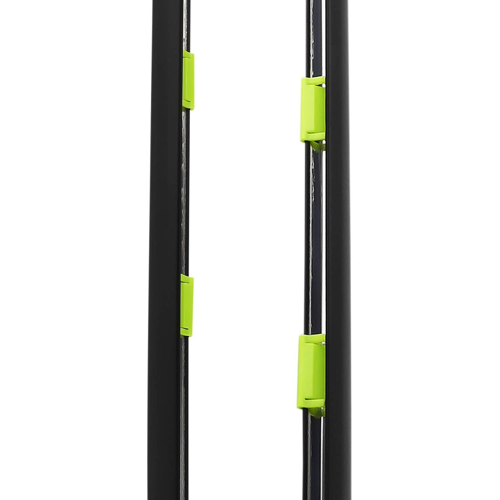 Two vertical black door seal strips with green clip tabs, close-up view