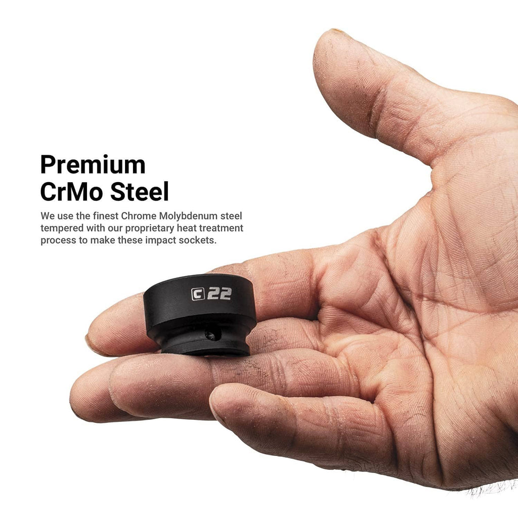 Stubby impact socket held in hand, black with raised 22 marking