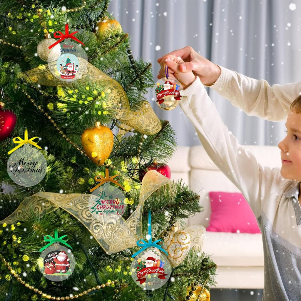 Clear round Christmas hanging ornaments with metal loops on a decorated tree