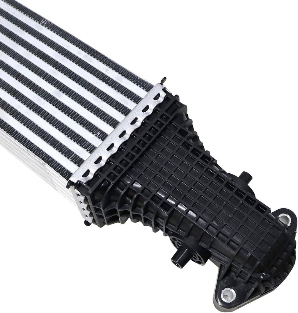 Intercooler end tank close-up with aluminum fin core and black mounting bracket.