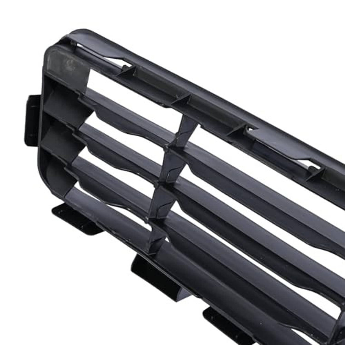 Front grille with black plastic slats and silver horizontal bars, close-up corner